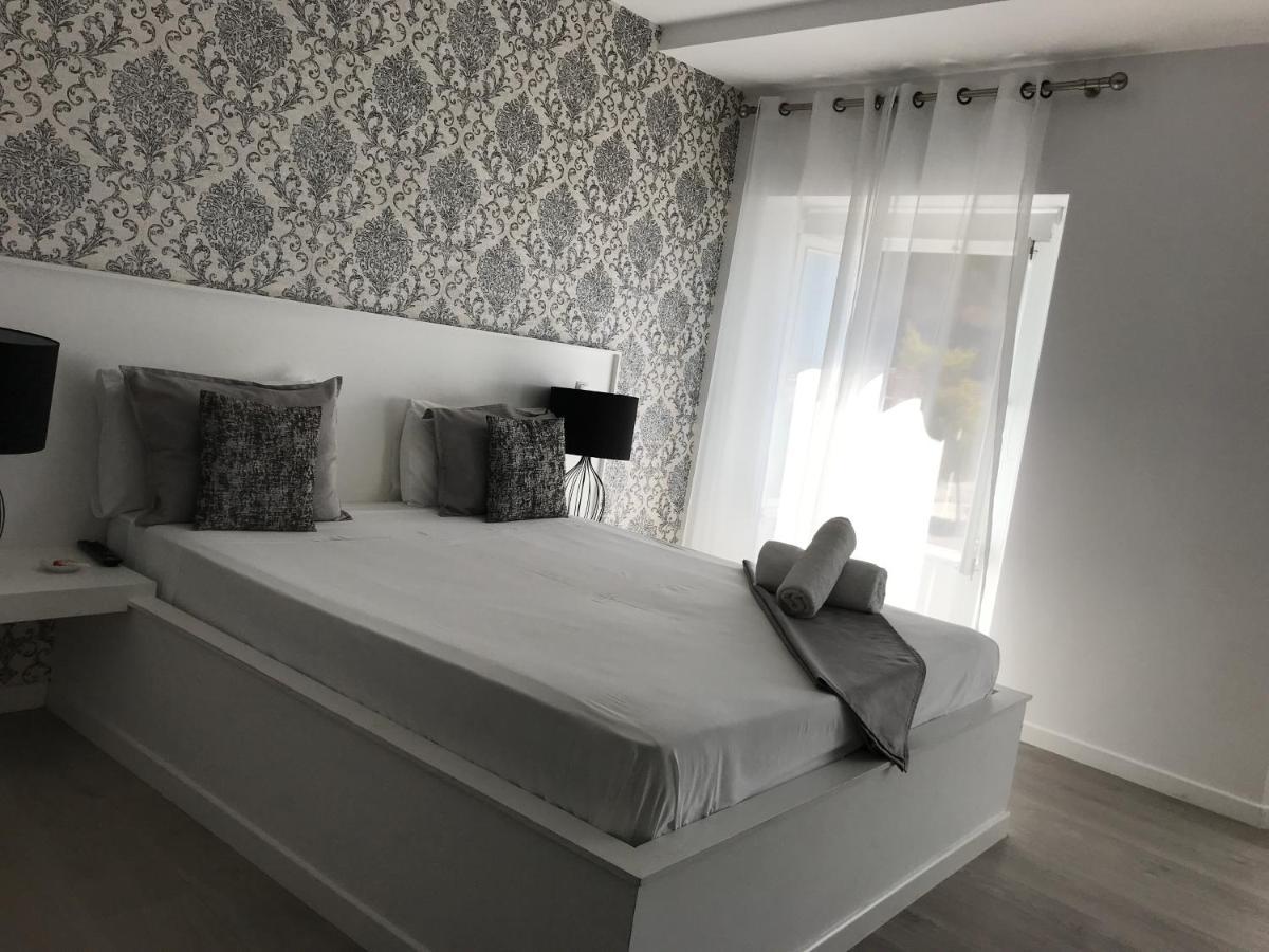 Tejos House Hotel Almada Esterno foto